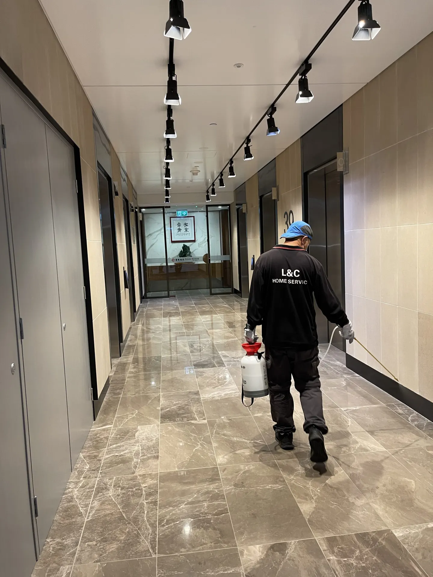 L&C Pest Management technician providing pest control service