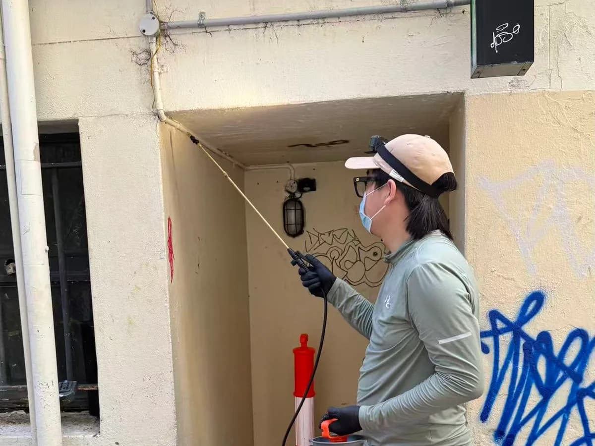L&C Pest Management technician treating a Sydney CBD commercial property service entrance