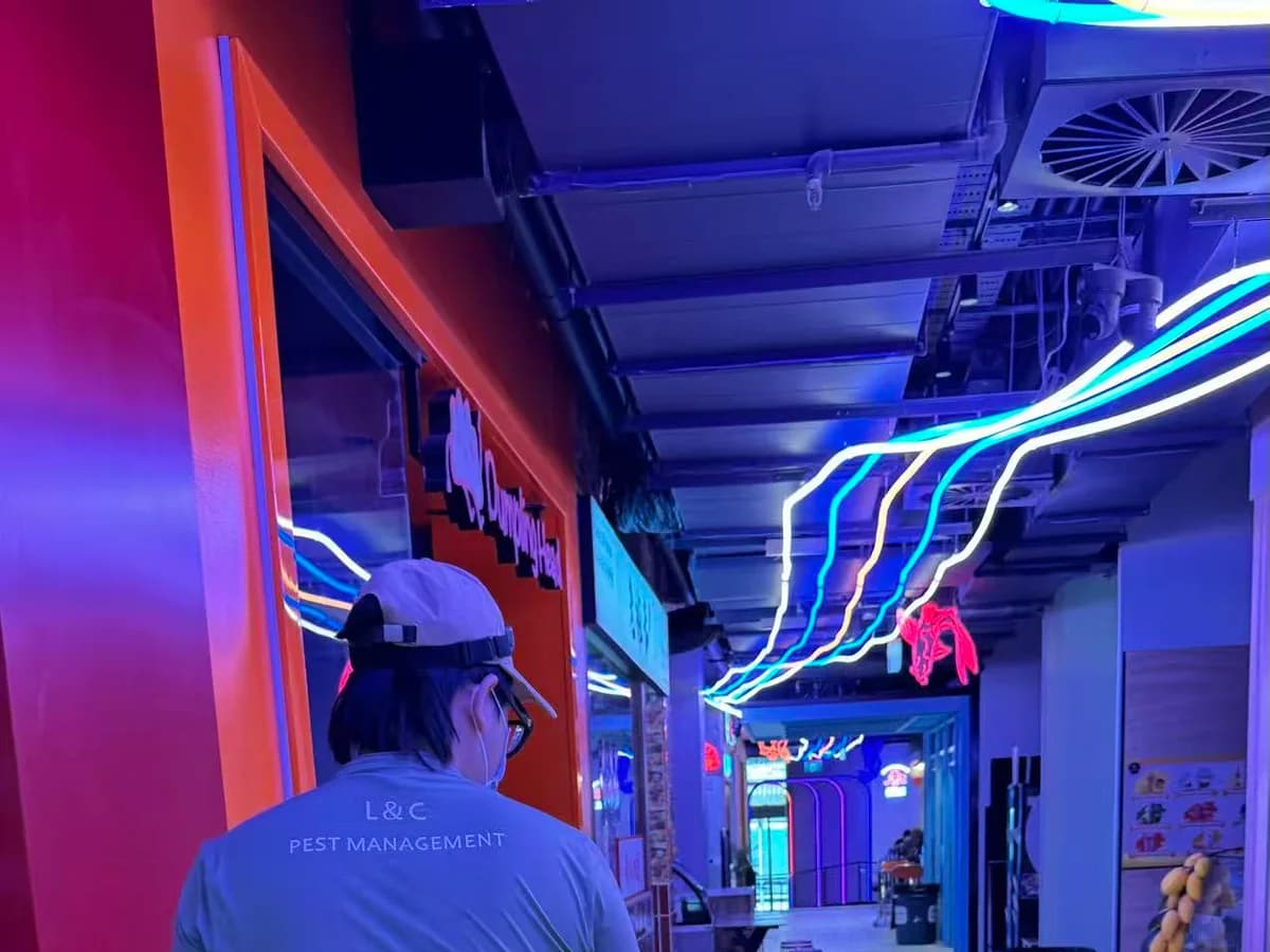 L&C Pest Management technician servicing a Sydney CBD retail arcade